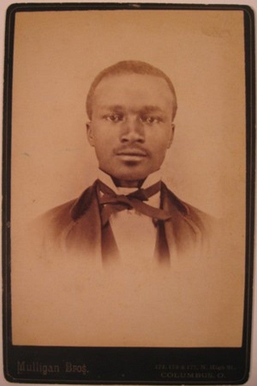 Item #15687 Upper body portrait of a Black man in suit with wing collar and bow tie.